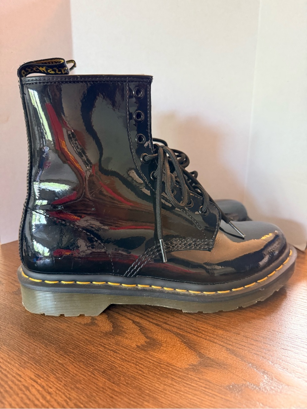 Dr. Doc Marten Black Patent Combat Boots with Yellow Stitching. Women size 9